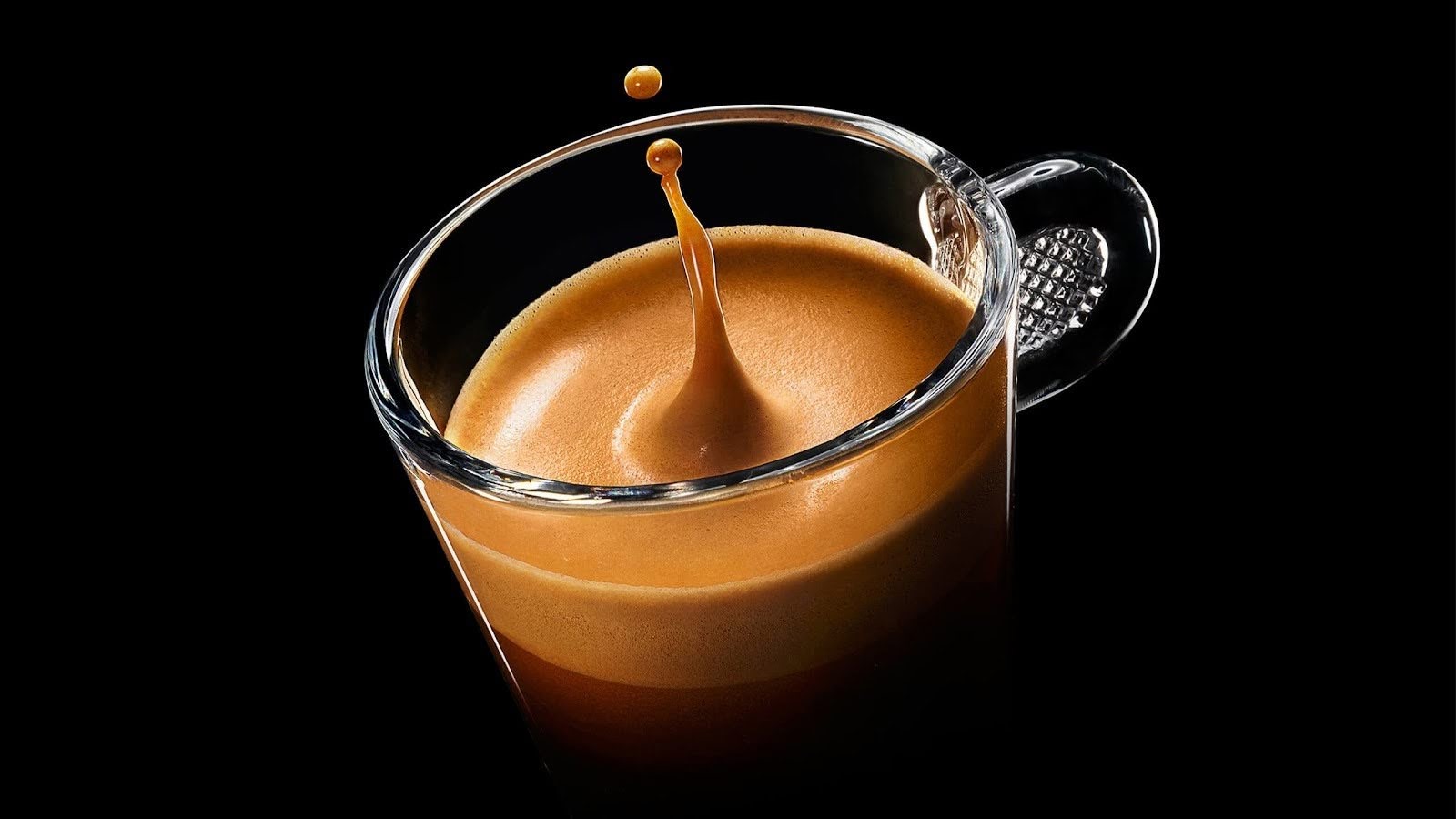 Nespresso — original global campaign imagery: stylized product shot on black